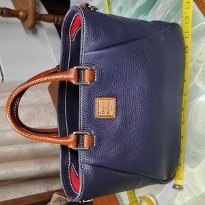 Navy and red Inside , Brown handles No Long Strap Purse.